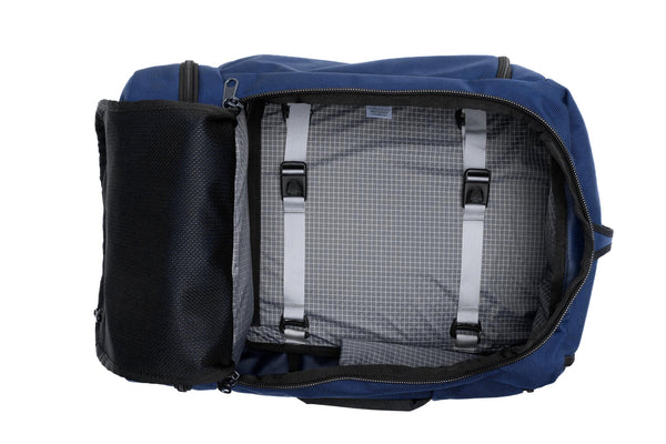An open Techonaut 45 with a Navy exterior and an Northwest Sky (light grey) interior.